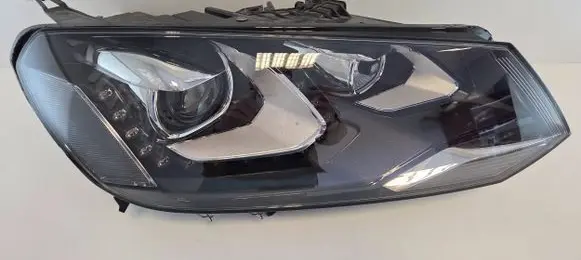 Volkswagen Touareg II Headlight/headlamp 1ZT01032802