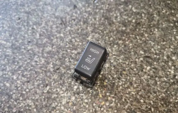 Seat heating switch