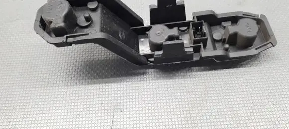 Nissan Micra Tail light bulb cover holder