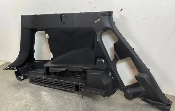 Trunk/boot lower side trim panel