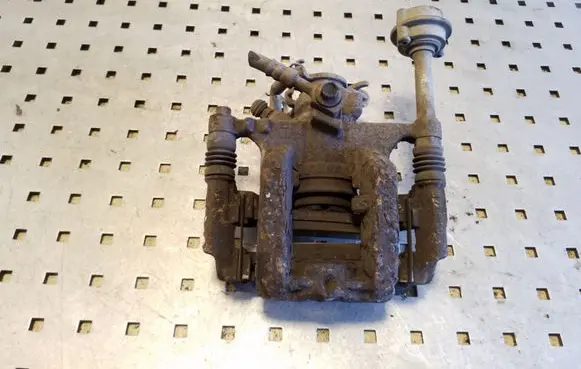 Opel Astra J Rear brake caliper
