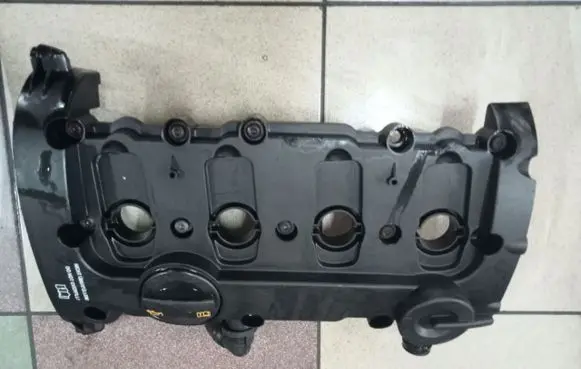 Rocker cam cover