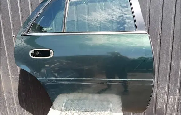 Cadillac DeVille Rear door
