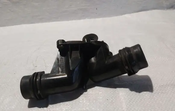 Thermostat/thermostat housing