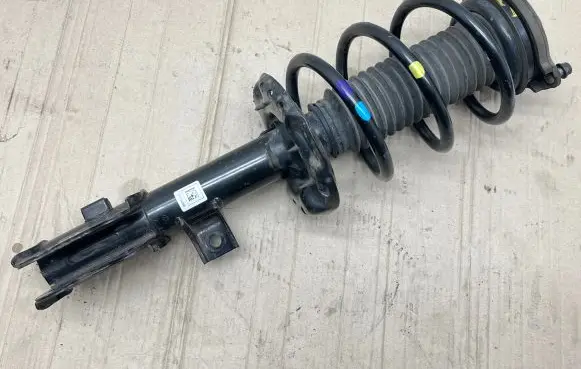 Hyundai Tucson TL Front shock absorber with coil spring 5466D7000