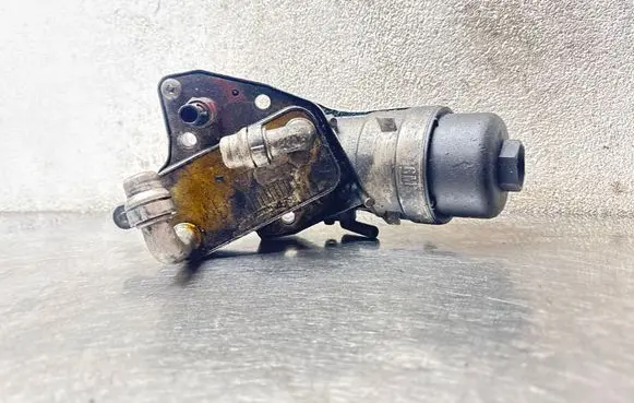 Opel Astra J Oil filter mounting bracket 55565958