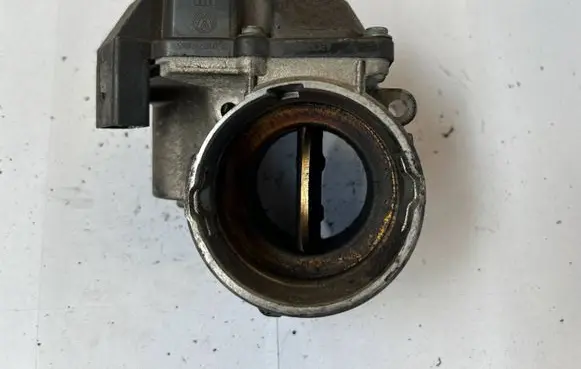 Volkswagen Touran I Throttle valve 03G128063A V320 0501074205