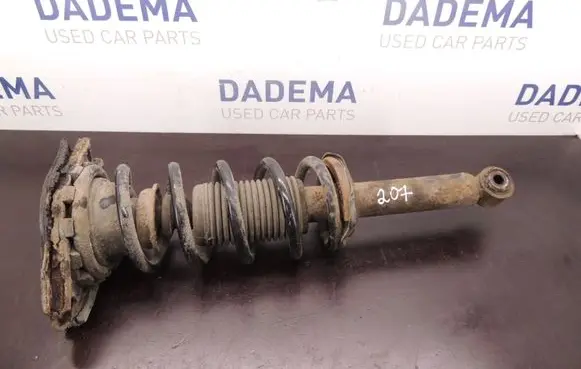Nissan Almera N16 Rear shock absorber with coil spring D207