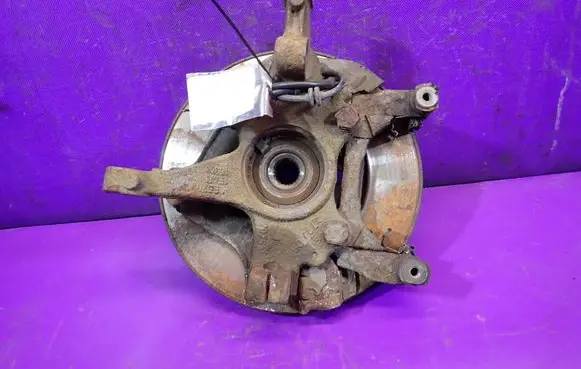 Opel Corsa D Front wheel hub spindle knuckle