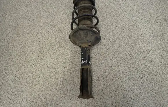 Toyota Yaris Front shock absorber with coil spring