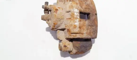 Mazda 323 F Front brake caliper