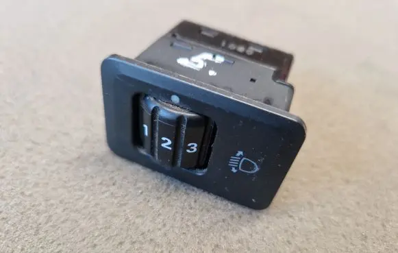 Mitsubishi Pajero Sport I Headlight level height control switch