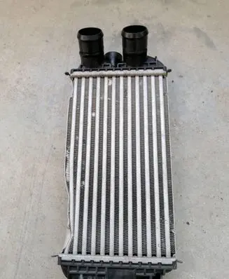Peugeot 208 Intercooler radiator 9824742280 JD1271006520