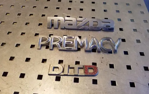 Mazda Premacy Manufacturers badge/model letters C10051720 C10051710