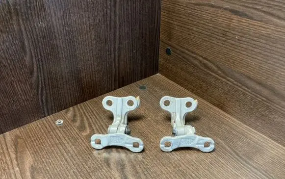 Front door lower hinge