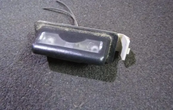 Mazda 323 Number plate light 8245