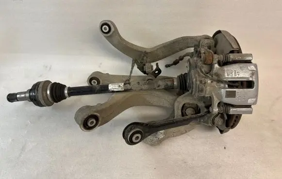 Rear wheel hub spindle/knuckle