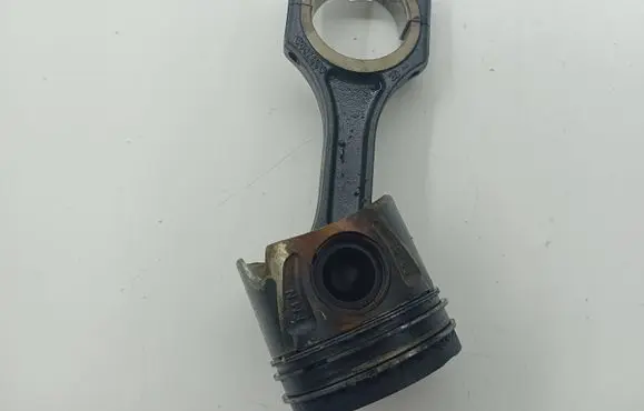 Piston with connecting rod