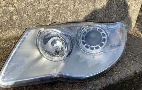 Volkswagen Touareg I Headlight/headlamp 7L6941031 1EL24703201