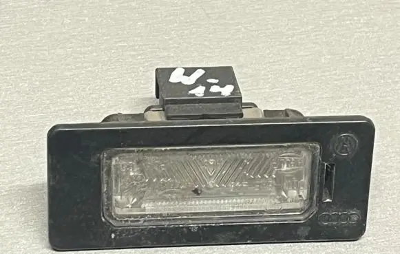 Volkswagen PASSAT B6 Number plate light 8T0943021