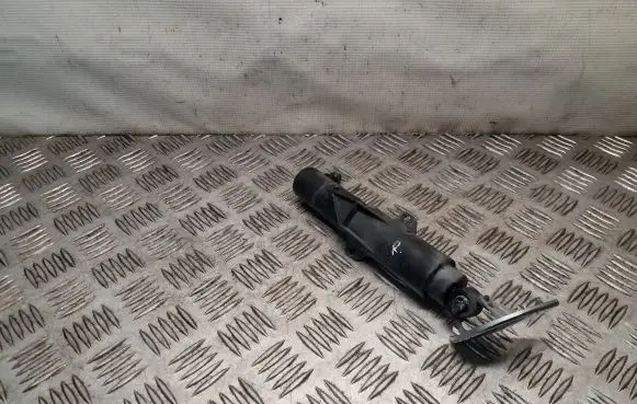 Headlight washer spray nozzle