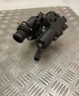 Thermostat/thermostat housing