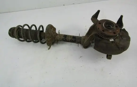 Volkswagen Golf IV Front shock absorber with coil spring 