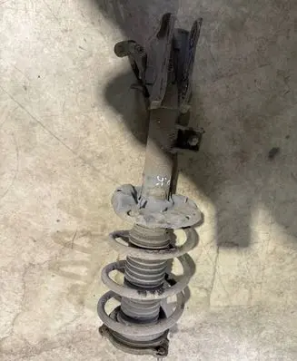 Hyundai Tucson TL Front shock absorber with coil spring