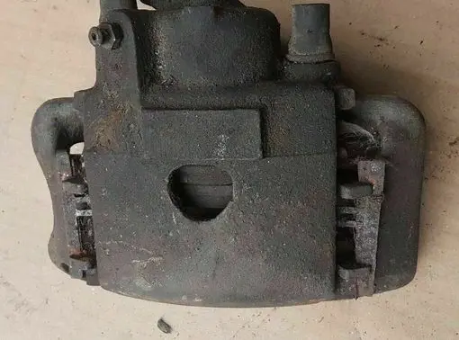Volkswagen Golf I Front brake caliper 171615124B