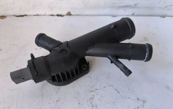Thermostat/thermostat housing