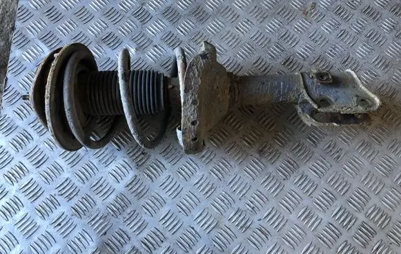 Subaru Legacy Front shock absorber with coil spring