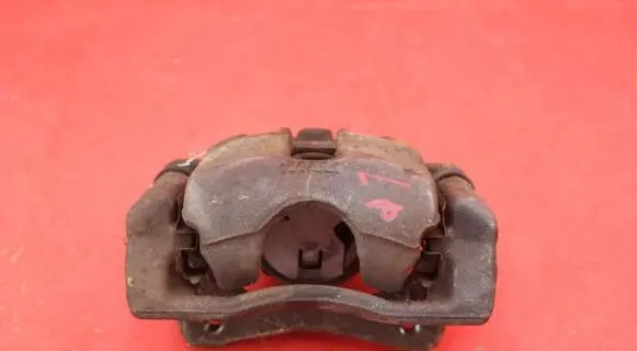 Nissan Note (E11) Front brake caliper