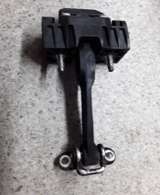 Rear door check strap stopper