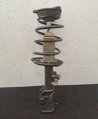 Front shock absorber with coil spring