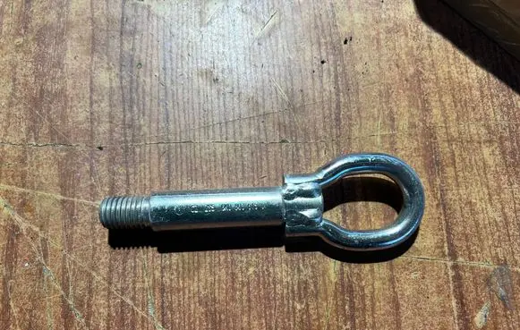 Towing hook eye