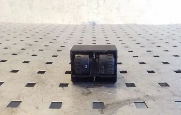 Headlight level height control switch
