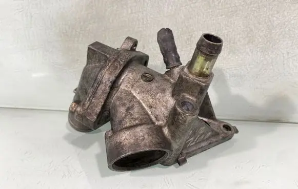 Thermostat/thermostat housing