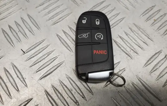 Jeep Grand Cherokee Ignition key/card 68143505AC