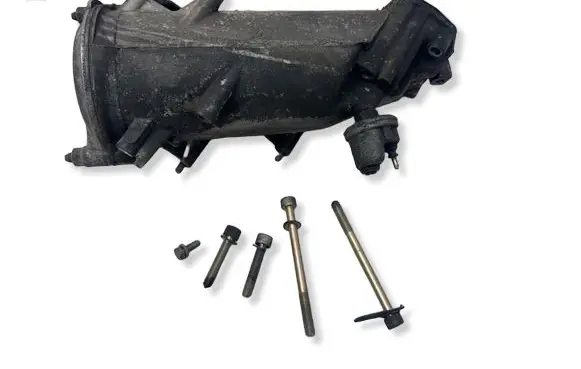 Mercedes-Benz E W124 Oil filter mounting bracket 6011840602 6011840025
