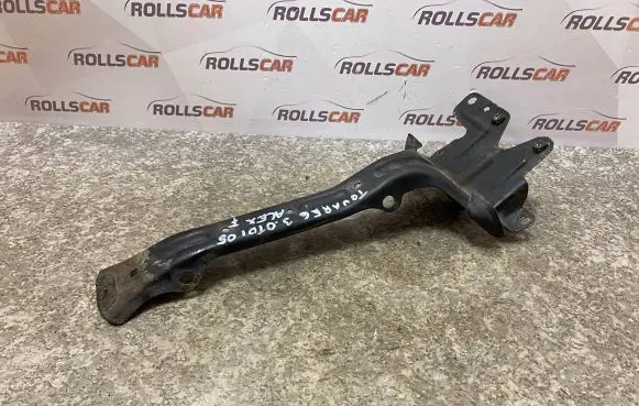 Volkswagen Touareg I Radiator support slam panel bracket 