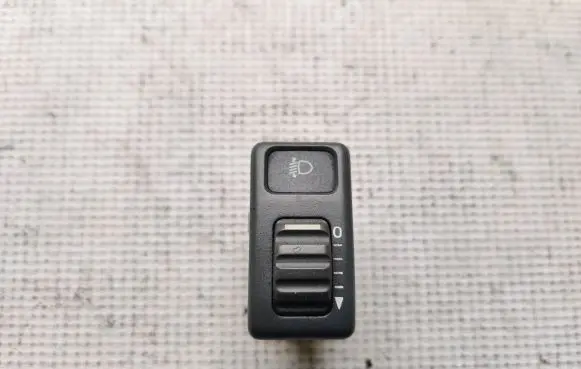 Headlight level height control switch