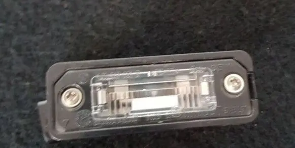 Volkswagen Phaeton Number plate light 1J6943021e