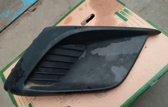 Mazda 3 II Front fog light trim/grill BHN150C11
