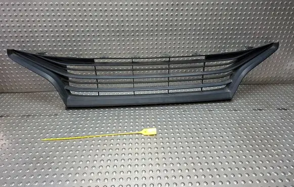 Toyota Yaris XP210 Front bumper upper radiator grill S27730612 53112K0010