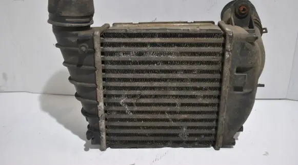 Volkswagen Golf IV Intercooler radiator 1J0145803S