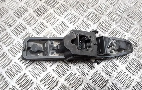 Tail light bulb cover holder