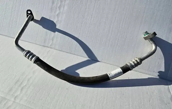 Hyundai Tucson IV NX4 Air conditioning (A/C) pipe/hose 97762N7210