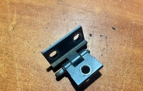 Rear door upper hinge