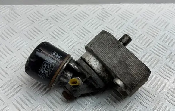 Nissan Micra Oil filter mounting bracket 2130000Q0B 2130000Q0K