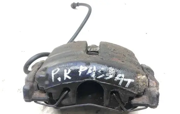 Volkswagen PASSAT B7 Front brake caliper